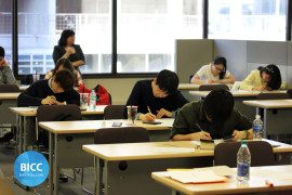 students giving an examination in the classroom